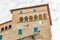 Tower with clock and waving Italian flag