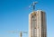 Tower crane builds a high-rise monolithic reinforced concrete house