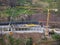 Tower cranes being used during road tunnel construction near Funchal in Madeira