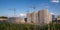 tower cranes on construction site, providing housing for low-income citizens of third world countries