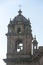 Tower and dome of the historic Iglesia de la Compania in Cusco