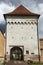 The tower and the entrance to the medieval fortress of the city Targu Mures, Transylvania.