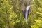 Tower fall Blurred waterfalls in the middle of green trees and mountains in yellowstone