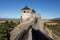 The tower and fortification of Boldogkovaralja castle in Hungary with tourists visiting the place