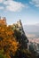 The tower of Fortress of Guaita on Monte Titano mountain - the highest in Republic of San Marino. Autumn landscape view