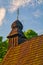 The tower of Greek Catholic wooden Church of the relics of St. Nicholas the Bishop in Ruska Bystra