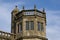 Tower with griffin statues, Lacock Abbey, in Lacock Wiltshire, England