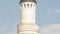 Tower of islamic Muslim mosque - pan shot