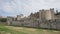 Tower of London in London, England, wide view of outer curtain wall