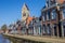 Tower of the martini church along a canal in Bolsward