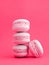 tower of pink pastel macarons close-up on bright viva magenta trend 2023 color background, Stack of four strawberry or