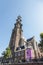 Tower of the Protestant Church of Westerkerk on the banks of the canal in Amsterdam