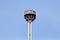 Tower with reflectors at the roundabout on the city street