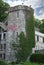 The tower of Ruby Falls, Tennessee in the summer with ivy.