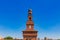 Tower of Sforzesco Castle under blue sky in downtown Milan, Ital
