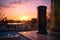 tower speaker on a balcony with a pool view at sunset