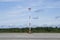 tower with spotlights on the runway. clear sunny day, blue sky background