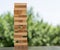 The tower stack from wooden blocks on table