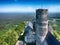 The tower of stone castle Bezdez on the hill with blue sky