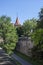 Tower TiergÃ¤rtnertorturm with high city wall, lower bastion and moat and southern castle garden, in the background the Nuremberg