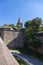 Tower TiergÃ¤rtnertorturm with high city wall, lower bastion and moat and southern castle garden, in the background the Nuremberg