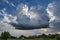 Towering cumulus: a developing thunderstorm over the idyllic countryside of Transylvania, Romania