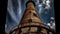 Towering Industrial Chimney Against Blue Sky Generative AI