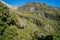 The towering lava columns of the Dieffenbach cliffs at the lower slopes of Mt Taranaki, New zealand.