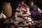 towering meringues, stacked and decorated with whipped cream and fresh berries