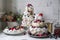 towering meringues, stacked and decorated with whipped cream and fresh berries