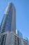 Towering modern building with blue sky background in sunny Austin Texas