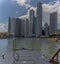 The towering skyscrapers of downtown Singapore viewed from a boat on the Singapore river Asia