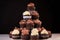 towering stack of chocolate cupcakes with cascading lace frosting