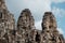 Towers of Bayon temple with smiling buddha faces at Angkor Thom complex, Siem Reap, Cambodia