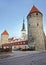 Towers of the city wall and Saint Olaf Church in the Old city of