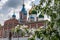 Towers and dome of temples and churches with white walls in Kolomna at the Cathedral Square