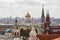 Towers and domes of Moscow  downtown: Kremlin tower and Cathedral of Christ the Savior at sunny day. Symbols of Moscow, Russia