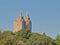 Towers of The El Dorado peeking over the trees of Central Park, New York