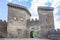 Towers and entrance and walls of an ancient fortress