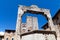 Towers and medieval well on Piazza della Cisterna in San Gimignano in tuscany in italy