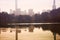 Towers metropolis of skyscrapers reflected in the pond Central P