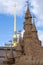 Towers of a Sand castle and Spire of Saints Peter and Paul Cathedral in Saint Petersburg