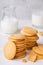 Towers of shortbread kamut cookies with glass and jug of milk