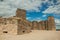 Towers and stone walls facade at the Castle of Trujillo