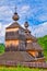 Towers of wooden church of St. Nicholas in Bodruzal during summer