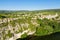 The town of Aigueze on the top of its cliff above the Ardeche in Europe, France, Ardeche, in summer, on a sunny day