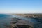 The town of Arromanches les Bains and its artificial harbor in Europe, France, Normandy, in summer, on a sunny day