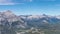 Town of Banff with surrounding mountains. Cascade Mountain, Lake Minnewanka and Mount Girouard in summer time season sunny day