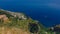 Town by blue sea and coastline of Amalfi Coast from Path of the Gods, near Positano, Italy