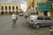 Town center of colonial village of Valladolid, in Yucatan Peninsula, Mexico with signs pointing to Merida, Chichen Itza and Cancun